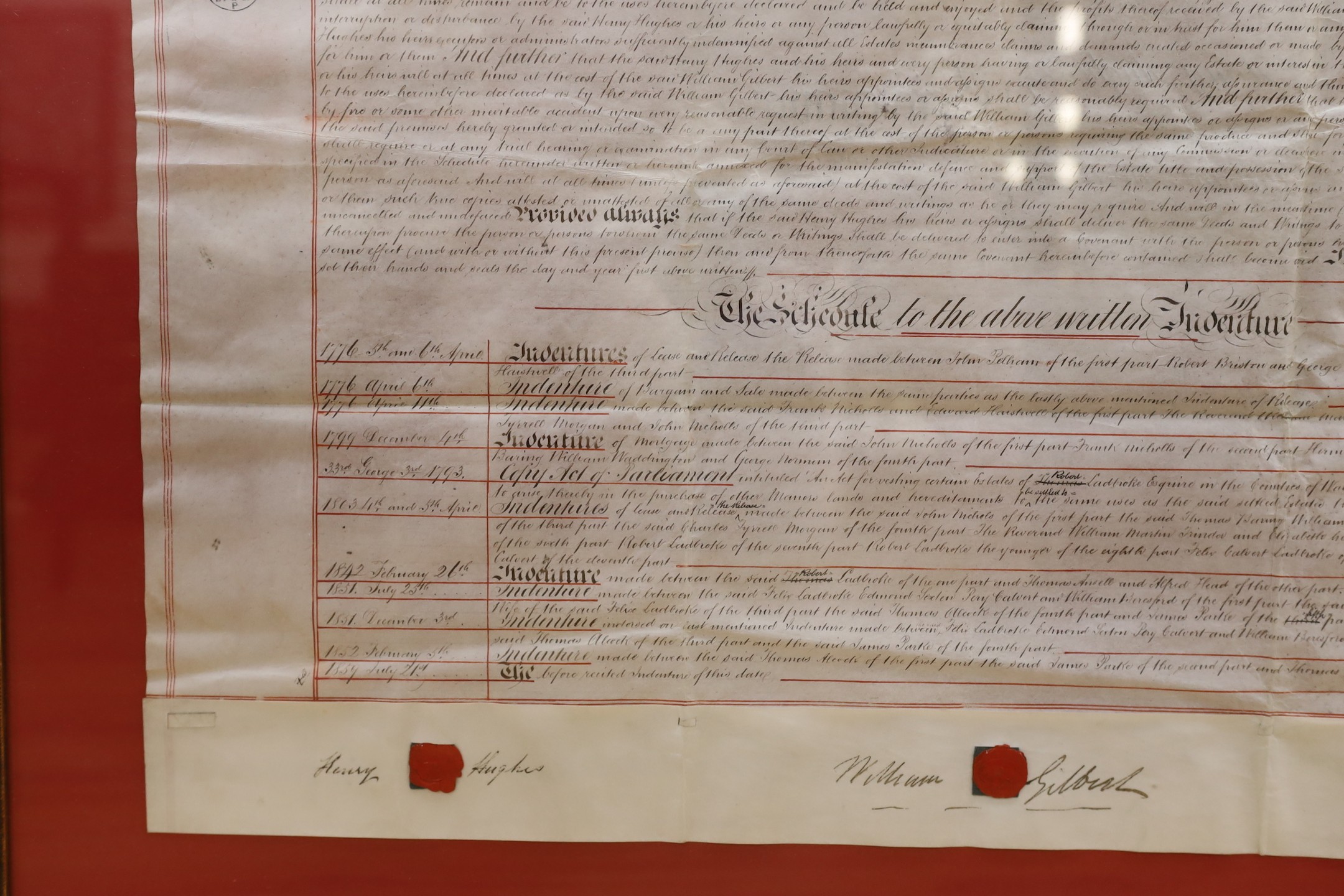 A framed 19th century indenture, for Henry Gilbert of Lingfield, 71 cms wide x 57 cms high.